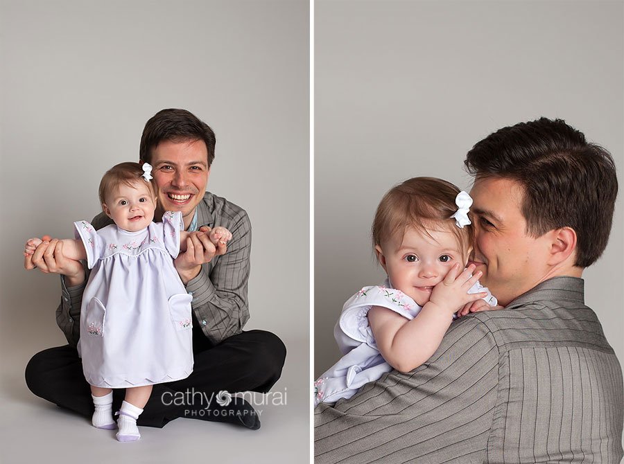 7months old happy baby in beautiful light purple dress smiling with her father for their father and daughter's shots during father's day portrait session taken by Alhambra Baby and Family Photographer, Cathy Murai Photography
