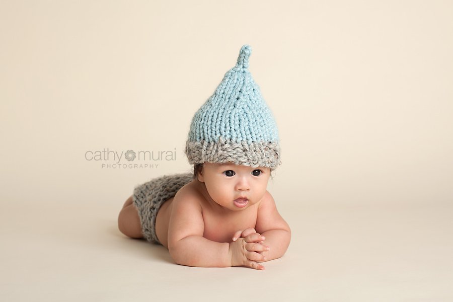 100 days old celebration, Asian Baby, 3 months old baby portraits,  3 months old baby picture, 100 day old,  baby boy,  3 months old baby image, Cathy Murai Photography, Alhambra, Baby, Photographer, Photography, San Gabriel Valley, Los Angeles,  a baby wearing a blue and grey knit hat and grey diaper cover during a  Baby Photography Session 