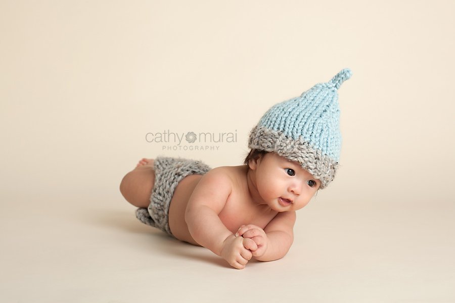 100 days old celebration, Asian Baby, 3 months old baby portraits,  3 months old baby picture, 100 day old,  baby boy,  3 months old baby image, Cathy Murai Photography, Alhambra, Baby, Photographer, Photography, San Gabriel Valley, Los Angeles,  a baby wearing a blue and grey knit hat and grey diaper cover during a  Baby Photography Session 