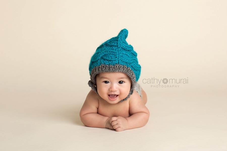 100 days old celebration, Asian Baby, 3 months old baby portraits,  3 months old baby picture, 100 day old,  baby boy,  3 months old baby image, Cathy Murai Photography, Alhambra, Baby, Photographer, Photography, San Gabriel Valley, Los Angeles,  a baby wearing a blue knit hat and grey diaper cover smiling during a  Baby Portrait Session 