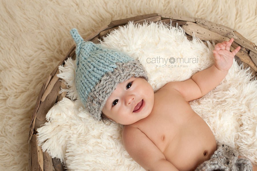 100 days old celebration, Asian Baby, 3 months old baby portraits,  3 months old baby picture, 100 day old,  baby boy,  3 months old baby image, Cathy Murai Photography, Alhambra, Baby, Photographer, Photography, San Gabriel Valley, Los Angeles,  baby wearing a blue and grey knit hat  looking at the camera 