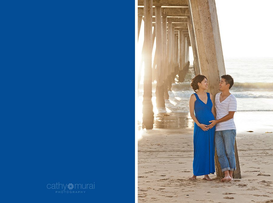 Adorable and sweet couple looking at each other and smiling at Manhattan Beach during maternity portrait session, mama-to-be, parents-to-be, blue maternity dress, Los Angeles Maternity photographer, Beach Session, Beach  Maternity Portrait Session, Maternity Session at Beach, Cathy Murai Photography