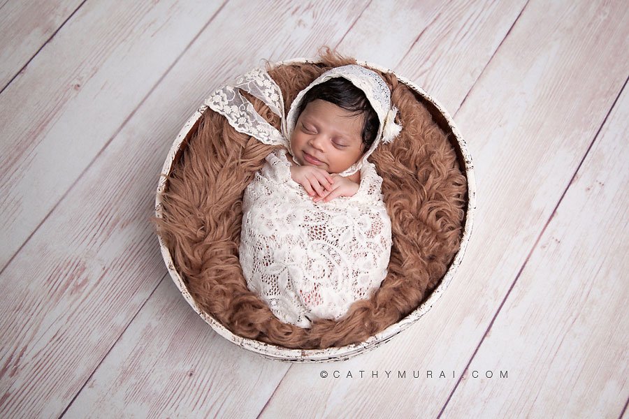 Newborn baby girl wrapped with cream lace wrap and wearing cream lace bonnet posing in the round antique bucket, indian newborn baby girl, indian newborn, indian newborn baby, best newborn photographer,Los Angeles newborn baby photographer,Los Angeles newborn baby photography,famous baby photographer,famous newborn photographer,los angeles newborn photographer,los angeles newborn photography,los angeles newborn photographer,los angeles newborn photography,los angeles twin newborn photographer,los angeles twin newborn photography,newborn photo shoot los angeles,newborn photographer los angeles,newborn photographer alhambra,newborn photography los angeles, premier newborn photographer, Pasadena newborn baby photographer,Pasadena newborn photographer,San Gabriel Valley newborn photography,San Gabriel Valley newborn photographer,Alhambra newborn photography,top newborn photographer, Las Tunas newborn photography,Las Tunas newborn photographer, Cathy Murai Photography, newborn and sibling photographer, newborn and sibling photography, newborn and sibling pictures, newborn and sibling photos newborn and sibling pictures