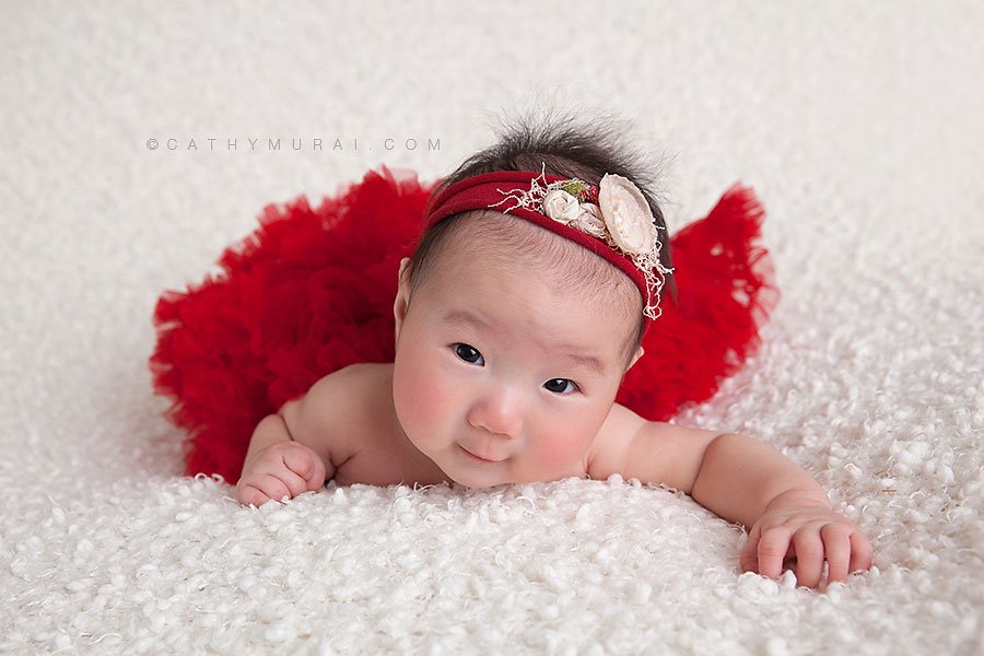3 months old baby girl wearing red pettiskirt and christmas headband, Christmas Baby Portrait Session, Los Angeles Christmas Baby Portrait Session, Alhambra Christmas Baby Portrait Session, Pasadena Christmas Baby Portrait Session, South Pasadena Christmas Baby Portrait Session, Las Tunas Christmas Baby Portrait Session, Rosemead Christmas Baby Portrait Session, San Marino Christmas Baby Portrait, El Monte Christmas Baby Portrait Session, South El Monte Christmas Baby Portrait Session, San Gabriel Valley Christmas Baby Portrait Session, Monrovia Christmas Baby Portrait Session, Glendale Christmas Baby Portrait Session, North Hollywood Christmas Baby Portrait Session, Los Angeles Christmas Baby photographer baby Christmas Baby photographer, Los Angeles Christmas Baby baby photography, famous baby photographer, famous Christmas Baby photographer, los Angeles best Christmas Baby photographer, Los Angeles Christmas Baby photography, los Angeles Christmas Baby photographer, los Angeles, Christmas Baby photography, Alhambra, Christmas Baby photography, Pasadena Christmas Baby baby photographer, Pasadena Christmas Baby photographer, San Gabriel Valley Christmas Baby photography, San Gabriel Valley Christmas Baby photographer, Alhambra Christmas Baby photography, Las Tunas Christmas Baby photography, Las Tunas Christmas Baby photographer, Baby Studio photography