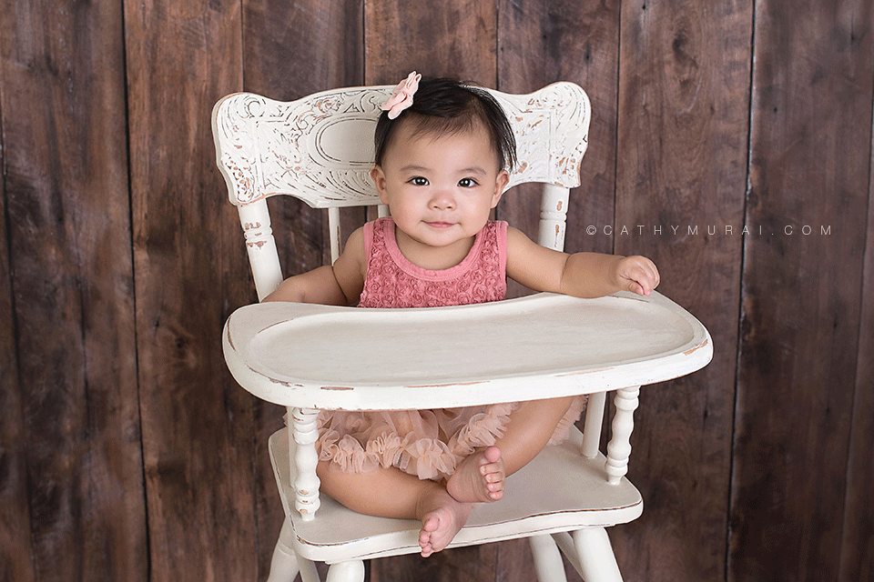 First Birthday Portraits, first birthday girl sitting on the white vintage high chair in front of the wooden backdrop, LOS ANGELES Birthday Portraits, LOS ANGELES 1st Birthday Portraits, LOS ANGELES first Birthday Portraits, LOS ANGELES 1st Birthday pictures, LOS ANGELES first Birthday pictures, LOS ANGELES Birthday pictures, LOS ANGELES 1st Birthday Photography, LOS ANGELES first Birthday Photography, LOS ANGELES Birthday Photography, LOS ANGELES first Birthday Photographer, LOS ANGELES 1st Birthday Photographer, LOS ANGELES Birthday Photographer, LOS ANGELES Baby Photographer, LOS ANGELES Baby Photography, LOS ANGELES Baby Photographer, Los Angeles Smash Cake, Los Angles Cake Smash, LA Birthday Portaits, LA 1st Birthday Portarits, LA first Birthday pictures, LA Birthday Photographer, LA Birthday Photography, LA first Birthday Photographer, LA first Birthday Photography, LA Baby Photographer, LA Baby Photography, LA Family Photographer, LA Family Photography, LA Smash Cake, LA Cake Smash, PASADENA Birthday Portraits, PASADENA 1st Birthday Portraits, PASADENA first Birthday pictures, PASADENA Birthday Photographer, PASADENA Birthday Photography, PASADENA first Birthday Photography, PASADENA first Birthday Photographer, PASADENA 1st Birthday Photographer, , PASADENA 1st Birthday Photography, PASADENA Baby Photographer, PASADENA Baby Photography, PASADENA Family Photographer, PASADENA Family Photography, Pasadena Smash Cake, Los Angles Cake Smash, SAN GABIEL VALLEY Birthday Portraits, SAN GABIEL VALLEY 1st Birthday Portraits, SAN GABIEL VALLEY first Birthday pictures, SAN GABIEL VALLEY Birthday Photographer, SAN GABIEL VALLEY Birthday Photography, SAN GABIEL VALLEY first Birthday Photography, SAN GABIEL VALLEY first Birthday Photographer, SAN GABIEL VALLEY 1st Birthday Photographer, , SAN GABIEL VALLEY 1st Birthday Photography, SAN GABIEL VALLEY Baby Photographer, SAN GABIEL VALLEY Baby Photography, SAN GABIEL VALLEY Family Photographer, SAN GABIEL VALLEY Family Photography, San Gabiel Valley Smash Cake, Los Angles Cake Smash, ALHAMBRA Birthday Portraits, ALHAMBRA 1st Birthday Portraits, ALHAMBRA first Birthday pictures, ALHAMBRA Birthday Photographer, ALHAMBRA Birthday Photography, ALHAMBRA first Birthday Photography, ALHAMBRA first Birthday Photographer, ALHAMBRA 1st Birthday Photographer, , ALHAMBRA 1st Birthday Photography, ALHAMBRA Baby Photographer, ALHAMBRA Baby Photography, ALHAMBRA Family Photographer, ALHAMBRA Family Photography, Alhambra Smash Cake, Los Angles Cake Smash, SAN MARINOBirthday Portraits, SAN MARINO1st Birthday Portraits, SAN MARINOfirst Birthday pictures, SAN MARINOBirthday Photographer, SAN MARINOBirthday Photography, SAN MARINOfirst Birthday Photography, SAN MARINOfirst Birthday Photographer, SAN MARINO1st Birthday Photographer, , SAN MARINO1st Birthday Photography, SAN MARINOBaby Photographer, SAN MARINOBaby Photography, SAN MARINOFamily Photographer, SAN MARINOFamily Photography, San MarinoSmash Cake, Los Angles Cake Smash, TEMPLE CITYBirthday Portraits, TEMPLE CITY1st Birthday Portraits, TEMPLE CITYfirst Birthday pictures, TEMPLE CITYBirthday Photographer, TEMPLE CITYBirthday Photography, TEMPLE CITYfirst Birthday Photography, TEMPLE CITYfirst Birthday Photographer, TEMPLE CITY1st Birthday Photographer, , TEMPLE CITY1st Birthday Photography, TEMPLE CITYBaby Photographer, TEMPLE CITYBaby Photography, TEMPLE CITYFamily Photographer, TEMPLE CITYFamily Photography, Temple CitySmash Cake, Los Angles Cake Smash, ROSEMEADBirthday Portraits, ROSEMEAD1st Birthday Portraits, ROSEMEADfirst Birthday pictures, ROSEMEADBirthday Photographer, ROSEMEADBirthday Photography, ROSEMEADfirst Birthday Photography, ROSEMEADfirst Birthday Photographer, ROSEMEAD1st Birthday Photographer, , ROSEMEAD1st Birthday Photography, ROSEMEADBaby Photographer, ROSEMEADBaby Photography, ROSEMEADFamily Photographer, ROSEMEADFamily Photography, RosemeadSmash Cake, Los Angles Cake Smash, DOWNTOWN LOS ANGELES Birthday Portraits, DOWNTOWN LOS ANGELES 1st Birthday Portraits, DOWNTOWN LOS ANGELES first Birthday pictures, DOWNTOWN LOS ANGELES Birthday Photographer, DOWNTOWN LOS ANGELES Birthday Photography, DOWNTOWN LOS ANGELES first Birthday Photography, DOWNTOWN LOS ANGELES first Birthday Photographer, DOWNTOWN LOS ANGELES 1st Birthday Photographer, , DOWNTOWN LOS ANGELES 1st Birthday Photography, DOWNTOWN LOS ANGELES Baby Photographer, DOWNTOWN LOS ANGELES Baby Photography, DOWNTOWN LOS ANGELES Family Photographer, DOWNTOWN LOS ANGELES Family Photography, Downtown Los Angeles Smash Cake, Los Angles Cake Smash