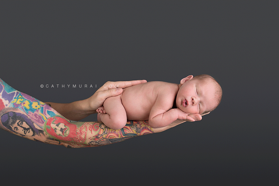 Newborn baby boy posing on his mother's arm, newborn and tattoo arm, newborn on mother's arm, 