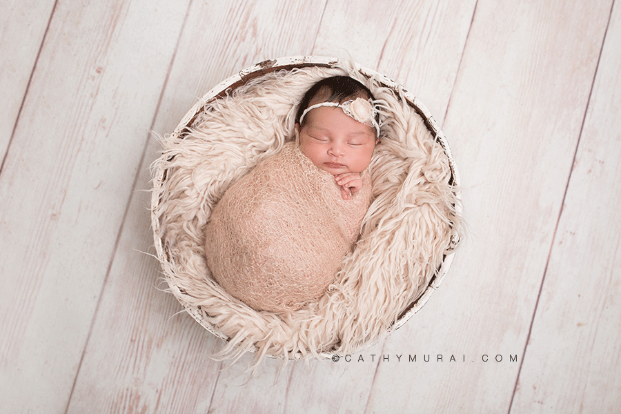 newborn baby girl in cream wrap wearing pink headband posing with her hands while sleeping in the round white bucket prop on the white wash wood floor, Cathy Murai Photography, LOS ANGELES Newborn Portraits, LOS ANGELES Newborn pictures, LOS ANGELES Newborn Images, LOS ANGELES Newborn Photographer, LOS ANGELES Newborn Photography, LOS ANGELES Newborn Studio Photographer, LOS ANGELES Newborn Studio Photography, Los Angeles the best Newborn photographer, LOS ANGELES Newborn and Family Photographer, LOS ANGELES Newborn and Family Photography, Los Angeles Newborn Posing Photography, Los Angeles Newborn and Siblings Photography, Los Angeles Newborn and Siblings Photographer, Los Angeles the best Newborn Photographer, Los Angeles Japanese Newborn Photographer, LOS ANGELES Professional Newborn Photography, LOS ANGELES Professional Newborn Photographer, Los Angeles Newborn Photo Studio ALHAMBRA Newborn Portraits, ALHAMBRA Newborn pictures, ALHAMBRA Newborn Images, ALHAMBRA Newborn Photographer, ALHAMBRA Newborn Photography, ALHAMBRA Newborn Studio Photographer, ALHAMBRA Newborn Studio Photography, Alhambra the best Newborn photographer, ALHAMBRA Newborn and Family Photographer, ALHAMBRA Newborn and Family Photography, Alhambra Newborn Posing Photography, Alhambra Newborn and Siblings Photography, Alhambra Newborn and Siblings Photographer, Alhambra the best Newborn Photographer, Alhambra Japanese Newborn Photographer, SAN MARINO Newborn Portraits, SAN MARINO Newborn pictures, SAN MARINO Newborn Images, SAN MARINO Newborn Photographer, SAN MARINO Newborn Photography, SAN MARINO Newborn Studio Photographer, SAN MARINO Newborn Studio Photography, SAN MARINO the best Newborn photographer, SAN MARINO Newborn and Family Photographer, SAN MARINO Newborn and Family Photography, SAN MARINO Newborn Posing Photography, SAN MARINO Newborn and Siblings Photography, SAN MARINO Newborn and Siblings Photographer, SAN MARINO the best Newborn Photographer, SAN MARINO Japanese Newborn Photographer, PASADENA Newborn Portraits, PASADENA Newborn pictures, PASADENA Newborn Images, PASADENA Newborn Photographer, PASADENA Newborn Photography, PASADENA Newborn Studio Photographer, PASADENA Newborn Studio Photography, PASADENA the best Newborn photographer, PASADENA Newborn and Family Photographer, PASADENA Newborn and Family Photography, PASADENA Newborn Posing Photography, PASADENA Newborn and Siblings Photography, PASADENA Newborn and Siblings Photographer, PASADENA the best Newborn Photographer, PASADENA Japanese Newborn Photographer, SOUTH PASADENA Newborn Portraits, SOUTH PASADENA Newborn pictures, SOUTH PASADENA Newborn Images, SOUTH PASADENA Newborn Photographer, SOUTH PASADENA Newborn Photography, SOUTH PASADENA Newborn Studio Photographer, SOUTH PASADENA Newborn Studio Photography, SOUTH PASADENA the best Newborn photographer, SOUTH PASADENA Newborn and Family Photographer, SOUTH PASADENA Newborn and Family Photography, SOUTH PASADENA Newborn Posing Photography, SOUTH PASADENA Newborn and Siblings Photography, SOUTH PASADENA Newborn and Siblings Photographer, SOUTH PASADENA the best Newborn Photographer, SOUTH PASADENA Japanese Newborn Photographer, SAN GABRIEL VALLEY Newborn Portraits, SAN GABRIEL VALLEY Newborn pictures, SAN GABRIEL VALLEY Newborn Images, SAN GABRIEL VALLEY Newborn Photographer, SAN GABRIEL VALLEY Newborn Photography, SAN GABRIEL VALLEY Newborn Studio Photographer, SAN GABRIEL VALLEY Newborn Studio Photography, SAN GABRIEL VALLEY the best Newborn photographer, SAN GABRIEL VALLEY Newborn and Family Photographer, SAN GABRIEL VALLEY Newborn and Family Photography, SAN GABRIEL VALLEY Newborn Posing Photography, SAN GABRIEL VALLEY Newborn and Siblings Photography, SAN GABRIEL VALLEY Newborn and Siblings Photographer, SAN GABRIEL VALLEY the best Newborn Photographer, SAN GABRIEL VALLEY Japanese Newborn Photographer, LA CANADA Newborn Portraits, LA CANADA Newborn pictures, LA CANADA Newborn Images, LA CANADA Newborn Photographer, LA CANADA Newborn Photography, LA CANADA Newborn Studio Photographer, LA CANADA Newborn Studio Photography, LA CANADA the best Newborn photographer, LA CANADA Newborn and Family Photographer, LA CANADA Newborn and Family Photography, LA CANADA Newborn Posing Photography, LA CANADA Newborn and Siblings Photography, LA CANADA Newborn and Siblings Photographer, LA CANADA the best Newborn Photographer, LA CANADA Japanese Newborn Photographer, MONROVIA Newborn Portraits, MONROVIA Newborn pictures, MONROVIA Newborn Images, MONROVIA Newborn Photographer, MONROVIA Newborn Photography, MONROVIA Newborn Studio Photographer, MONROVIA Newborn Studio Photography, MONROVIA the best Newborn photographer, MONROVIA Newborn and Family Photographer, MONROVIA Newborn and Family Photography, MONROVIA Newborn Posing Photography, MONROVIA Newborn and Siblings Photography, MONROVIA Newborn and Siblings Photographer, MONROVIA the best Newborn Photographer, MONROVIA Japanese Newborn Photographer, LAS TUNAS Newborn Portraits, LAS TUNAS Newborn pictures, LAS TUNAS Newborn Images, LAS TUNAS Newborn Photographer, LAS TUNAS Newborn Photography, LAS TUNAS Newborn Studio Photographer, LAS TUNAS Newborn Studio Photography, LAS TUNAS the best Newborn photographer, LAS TUNAS Newborn and Family Photographer, LAS TUNAS Newborn and Family Photography, LAS TUNAS Newborn Posing Photography, LAS TUNAS Newborn and Siblings Photography, LAS TUNAS Newborn and Siblings Photographer, LAS TUNAS the best Newborn Photographer, LAS TUNAS Japanese Newborn Photographer, ROSEMEAD Newborn Portraits, ROSEMEAD Newborn pictures, ROSEMEAD Newborn Images, ROSEMEAD Newborn Photographer, ROSEMEAD Newborn Photography, ROSEMEAD Newborn Studio Photographer, ROSEMEAD Newborn Studio Photography, ROSEMEAD the best Newborn photographer, ROSEMEAD Newborn and Family Photographer, ROSEMEAD Newborn and Family Photography, ROSEMEAD Newborn Posing Photography, ROSEMEAD Newborn and Siblings Photography, ROSEMEAD Newborn and Siblings Photographer, ROSEMEAD the best Newborn Photographer, ROSEMEAD Japanese Newborn Photographer, organic newborn photography, organic newborn photographer, organic newborn portrait, organic newborn picture, organic newborn image, newborn posing, baby posing, newborn hotos, baby photo, baby wrapping, newborn wrap, best newborn, best baby, baby photo baby photography, baby props, babies, newborns, newborn photography ideas 
