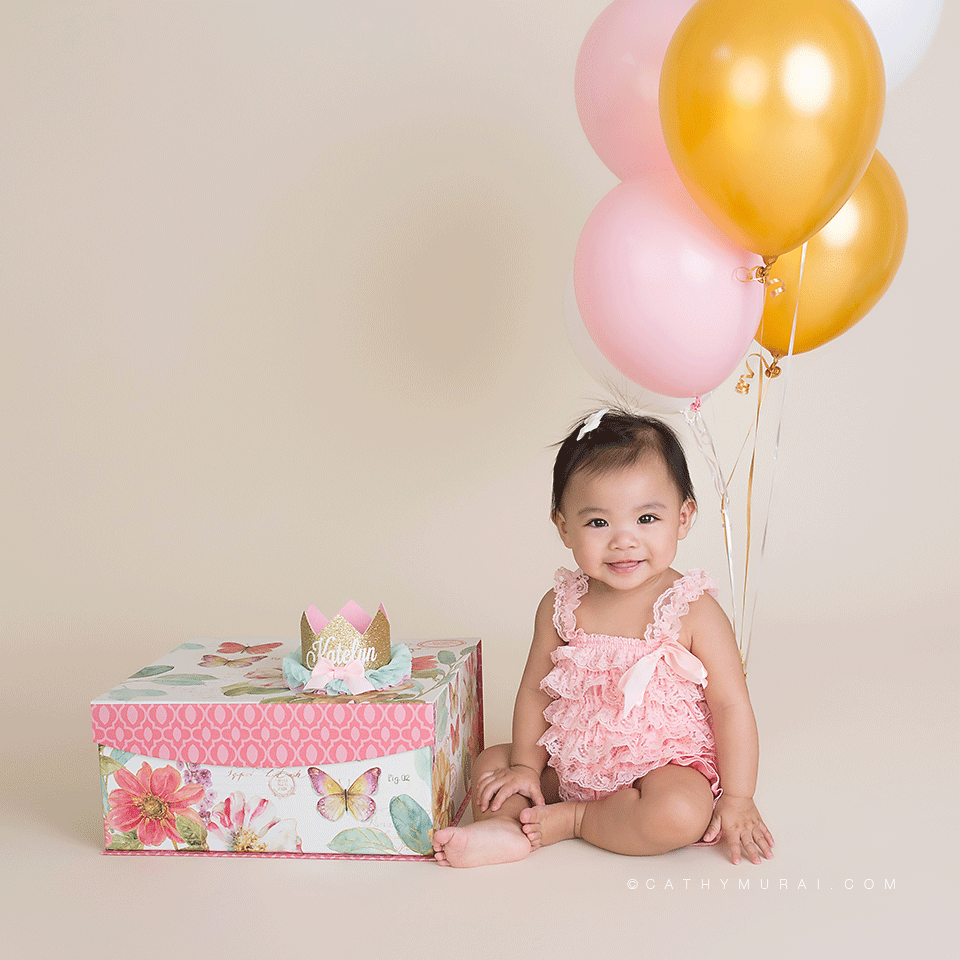 first birthday girl wearing pink lace romper sitting next to her birthday crown, butterfly, ? LOS ANGELES Birthday Portraits, LOS ANGELES 1st Birthday Portraits, LOS ANGELES first Birthday Portraits, LOS ANGELES 1st Birthday pictures, LOS ANGELES first Birthday pictures, LOS ANGELES Birthday pictures, LOS ANGELES 1st Birthday Photography, LOS ANGELES first Birthday Photography, LOS ANGELES Birthday Photography, LOS ANGELES first Birthday Photographer, LOS ANGELES 1st Birthday Photographer, LOS ANGELES Birthday Photographer, LOS ANGELES Baby Photographer, LOS ANGELES Baby Photography, LOS ANGELES Baby Photographer, Los Angeles Smash Cake, Los Angles Cake Smash, LA Birthday Portaits, LA 1st Birthday Portarits, LA first Birthday pictures, LA Birthday Photographer, LA Birthday Photography, LA first Birthday Photographer, LA first Birthday Photography, LA Baby Photographer, LA Baby Photography, LA Family Photographer, LA Family Photography, LA Smash Cake, LA Cake Smash, PASADENA Birthday Portraits, PASADENA 1st Birthday Portraits, PASADENA first Birthday pictures, PASADENA Birthday Photographer, PASADENA Birthday Photography, PASADENA first Birthday Photography, PASADENA first Birthday Photographer, PASADENA 1st Birthday Photographer, , PASADENA 1st Birthday Photography, PASADENA Baby Photographer, PASADENA Baby Photography, PASADENA Family Photographer, PASADENA Family Photography, Pasadena Smash Cake, Los Angles Cake Smash, SAN GABIEL VALLEY Birthday Portraits, SAN GABIEL VALLEY 1st Birthday Portraits, SAN GABIEL VALLEY first Birthday pictures, SAN GABIEL VALLEY Birthday Photographer, SAN GABIEL VALLEY Birthday Photography, SAN GABIEL VALLEY first Birthday Photography, SAN GABIEL VALLEY first Birthday Photographer, SAN GABIEL VALLEY 1st Birthday Photographer, , SAN GABIEL VALLEY 1st Birthday Photography, SAN GABIEL VALLEY Baby Photographer, SAN GABIEL VALLEY Baby Photography, SAN GABIEL VALLEY Family Photographer, SAN GABIEL VALLEY Family Photography, San Gabiel Valley Smash Cake, Los Angles Cake Smash, ALHAMBRA Birthday Portraits, ALHAMBRA 1st Birthday Portraits, ALHAMBRA first Birthday pictures, ALHAMBRA Birthday Photographer, ALHAMBRA Birthday Photography, ALHAMBRA first Birthday Photography, ALHAMBRA first Birthday Photographer, ALHAMBRA 1st Birthday Photographer, , ALHAMBRA 1st Birthday Photography, ALHAMBRA Baby Photographer, ALHAMBRA Baby Photography, ALHAMBRA Family Photographer, ALHAMBRA Family Photography, Alhambra Smash Cake, Los Angles Cake Smash, SAN MARINOBirthday Portraits, SAN MARINO1st Birthday Portraits, SAN MARINOfirst Birthday pictures, SAN MARINOBirthday Photographer, SAN MARINOBirthday Photography, SAN MARINOfirst Birthday Photography, SAN MARINOfirst Birthday Photographer, SAN MARINO1st Birthday Photographer, , SAN MARINO1st Birthday Photography, SAN MARINOBaby Photographer, SAN MARINOBaby Photography, SAN MARINOFamily Photographer, SAN MARINOFamily Photography, San MarinoSmash Cake, Los Angles Cake Smash, TEMPLE CITYBirthday Portraits, TEMPLE CITY1st Birthday Portraits, TEMPLE CITYfirst Birthday pictures, TEMPLE CITYBirthday Photographer, TEMPLE CITYBirthday Photography, TEMPLE CITYfirst Birthday Photography, TEMPLE CITYfirst Birthday Photographer, TEMPLE CITY1st Birthday Photographer, , TEMPLE CITY1st Birthday Photography, TEMPLE CITYBaby Photographer, TEMPLE CITYBaby Photography, TEMPLE CITYFamily Photographer, TEMPLE CITYFamily Photography, Temple CitySmash Cake, Los Angles Cake Smash, ROSEMEADBirthday Portraits, ROSEMEAD1st Birthday Portraits, ROSEMEADfirst Birthday pictures, ROSEMEADBirthday Photographer, ROSEMEADBirthday Photography, ROSEMEADfirst Birthday Photography, ROSEMEADfirst Birthday Photographer, ROSEMEAD1st Birthday Photographer, , ROSEMEAD1st Birthday Photography, ROSEMEADBaby Photographer, ROSEMEADBaby Photography, ROSEMEADFamily Photographer, ROSEMEADFamily Photography, RosemeadSmash Cake, Los Angles Cake Smash, DOWNTOWN LOS ANGELES Birthday Portraits, DOWNTOWN LOS ANGELES 1st Birthday Portraits, DOWNTOWN LOS ANGELES first Birthday pictures, DOWNTOWN LOS ANGELES Birthday Photographer, DOWNTOWN LOS ANGELES Birthday Photography, DOWNTOWN LOS ANGELES first Birthday Photography, DOWNTOWN LOS ANGELES first Birthday Photographer, DOWNTOWN LOS ANGELES 1st Birthday Photographer, , DOWNTOWN LOS ANGELES 1st Birthday Photography, DOWNTOWN LOS ANGELES Baby Photographer, DOWNTOWN LOS ANGELES Baby Photography, DOWNTOWN LOS ANGELES Family Photographer, DOWNTOWN LOS ANGELES Family Photography, Downtown Los Angeles Smash Cake, Los Angles Cake Smash, first birthday prop, 1st birthday prop, birthday prop
