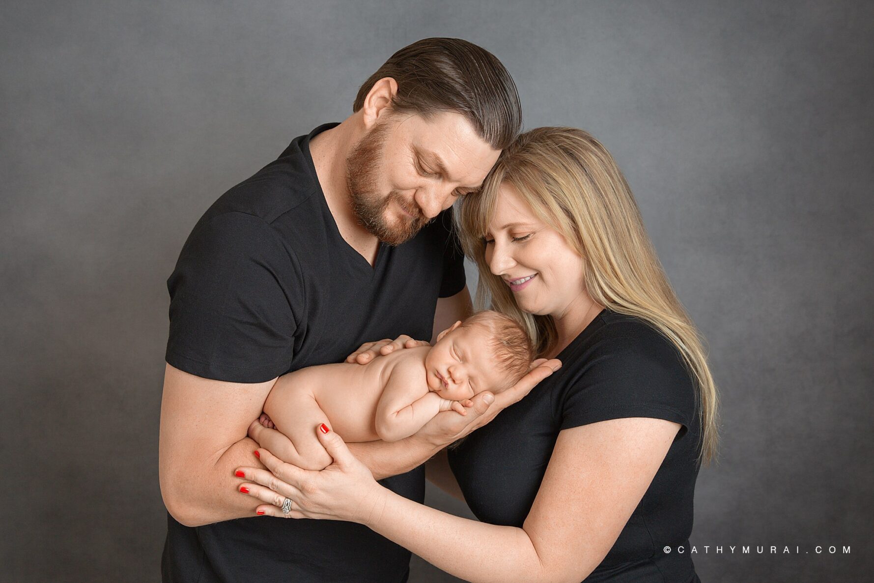 Classic family portrait with a newborn baby.